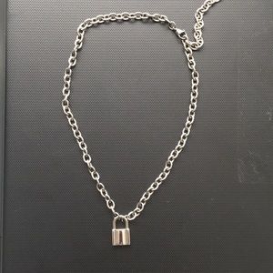 Silver chain necklace with lock